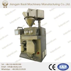 回転振動乾式造粒装置